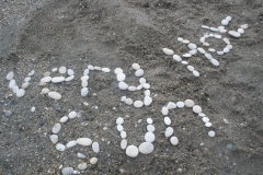 Our white pebble art on the beach
