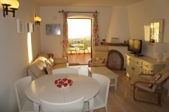 The living room out to the balcony